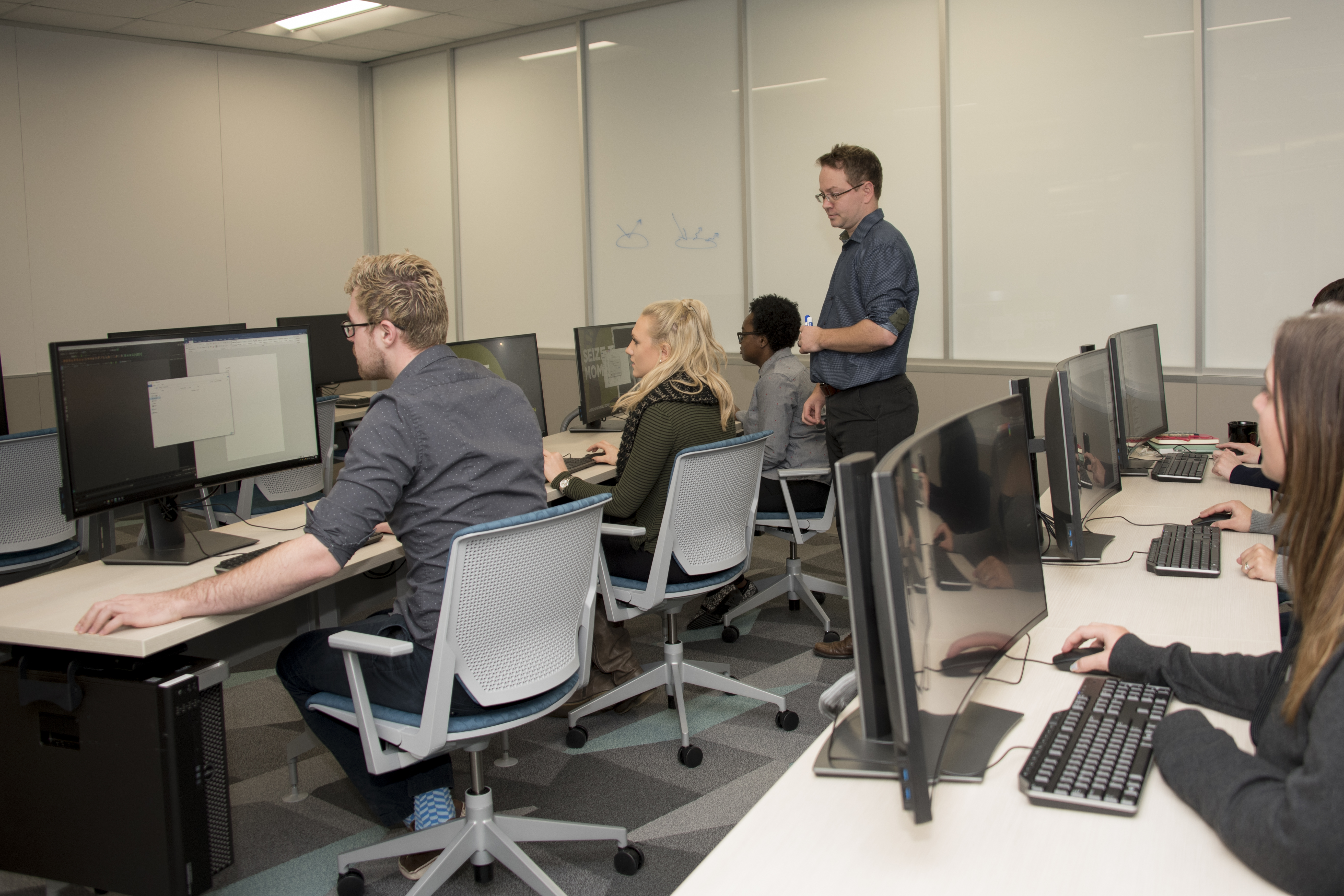 Image of an MSU Librarian teaching a class in the Digital Scholarship Lab Classroom